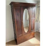 An Edwardian single door wardrobe. 195 x 130 x 52c