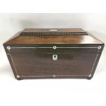 A William IV rosewood tea caddy inlaid with mother