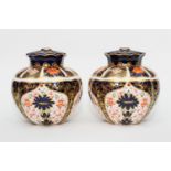 A pair of Royal Crown Derby quality porcelain pot