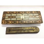 A Masonic cribbage board and a wooden and brass thermometer (2).
