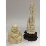 Two early 20th Century ivory carved figures of a s