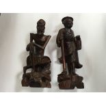 Two Japanese carved figures, one sitting, one carr