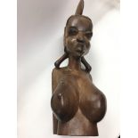 A wood carved African bust of a female tribeswoman