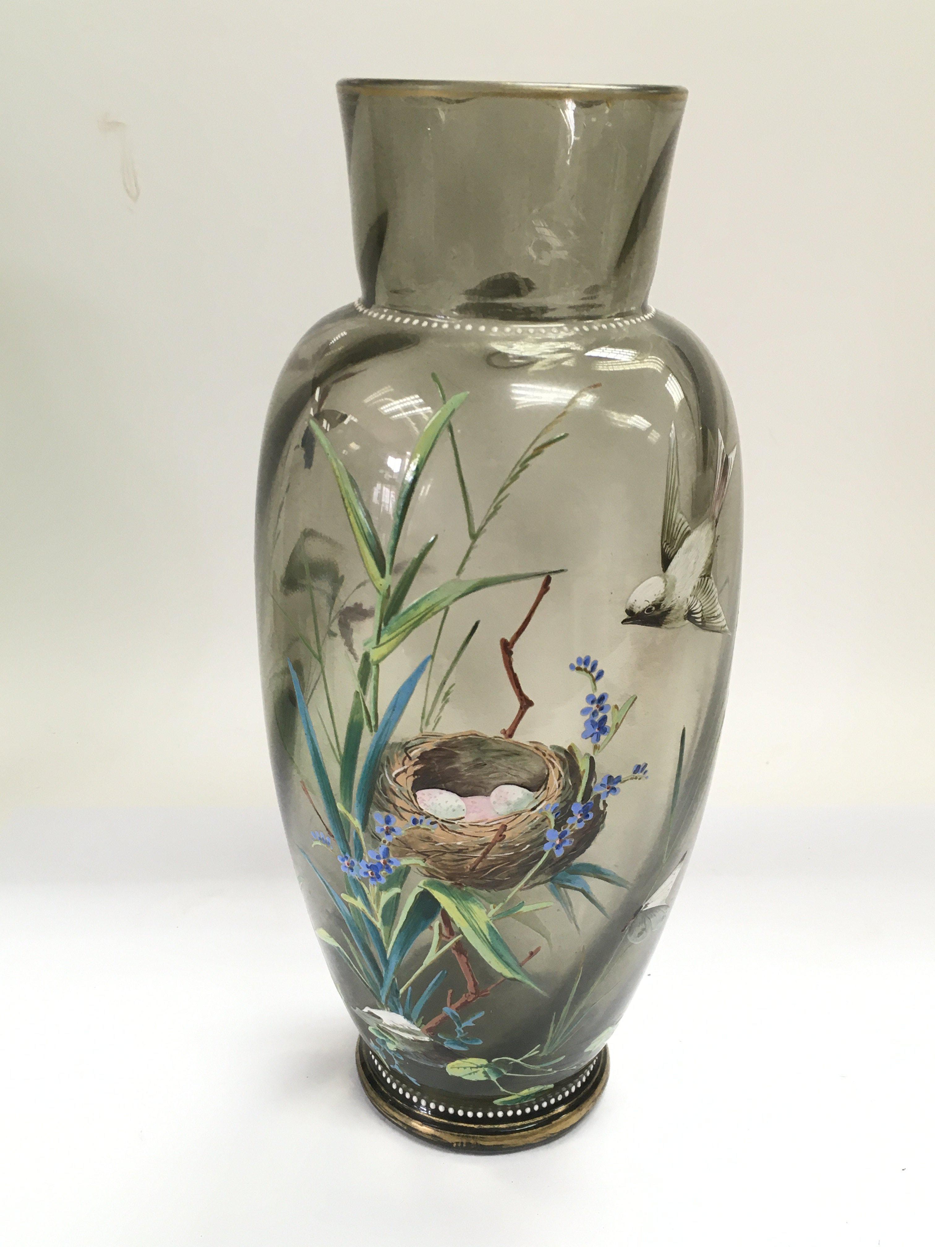 A quality glass vase with enamel decoration of a n