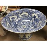 A large blue and white ornamental planter with dragons as pictured. Approximately measuring in
