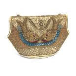A vintage bead and sequin handbag, having the design of two fish on the back