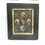 A framed religious icon set with porcelain panels,