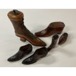 A very nice selection of Treen shoes, 2 being snuf