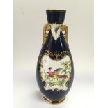 A 1904 Royal Worcester vase in blue with giltwork