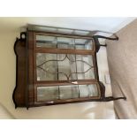 An EdwRdian double bow fronted display cabinet wit