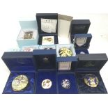 A collection of Halcyon Days Enamel boxes and Roya
