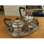 A silver plated tea set on tray