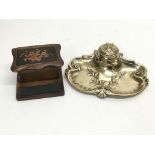 An old inlaid stamp box together with a turn of the century brass inkwell