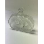 A Lalique perfume bottle in the form of flower hea
