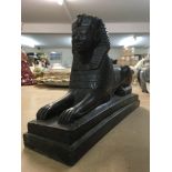 A Victorian style figure of Sphinx. Length 27cm -