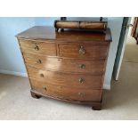 A Victorian mahogany 5 draw bow fronted chest of d