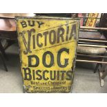 Antique embossed metal sign for Victoria Dog Biscu