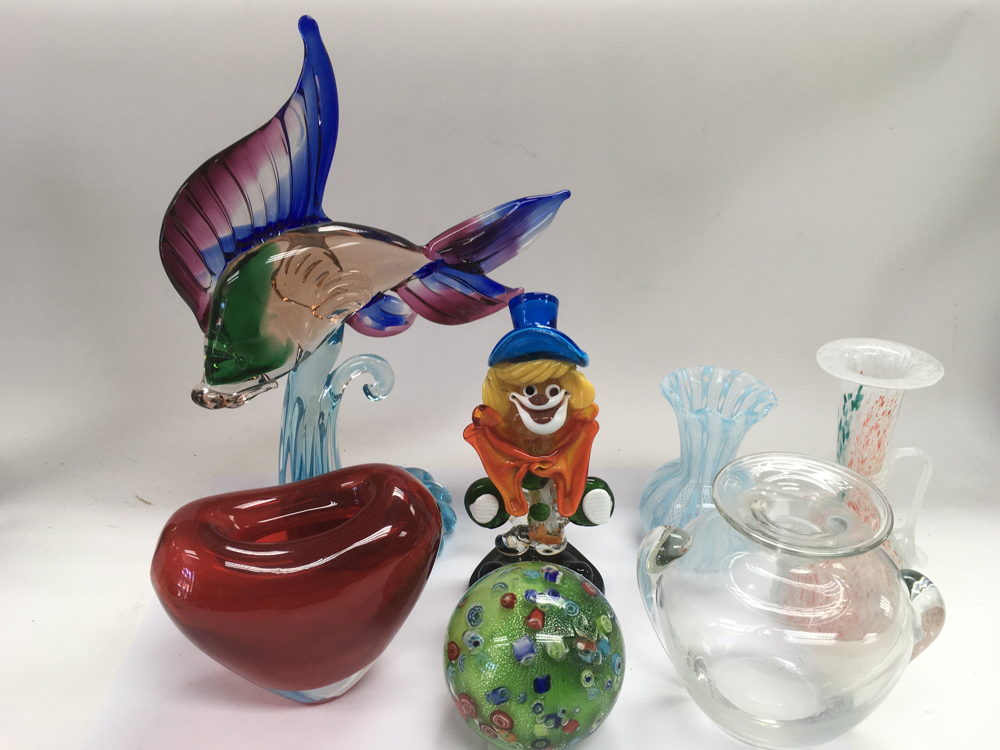 A Murano glass fish, Murano clown and other coloured glassware, a/f.