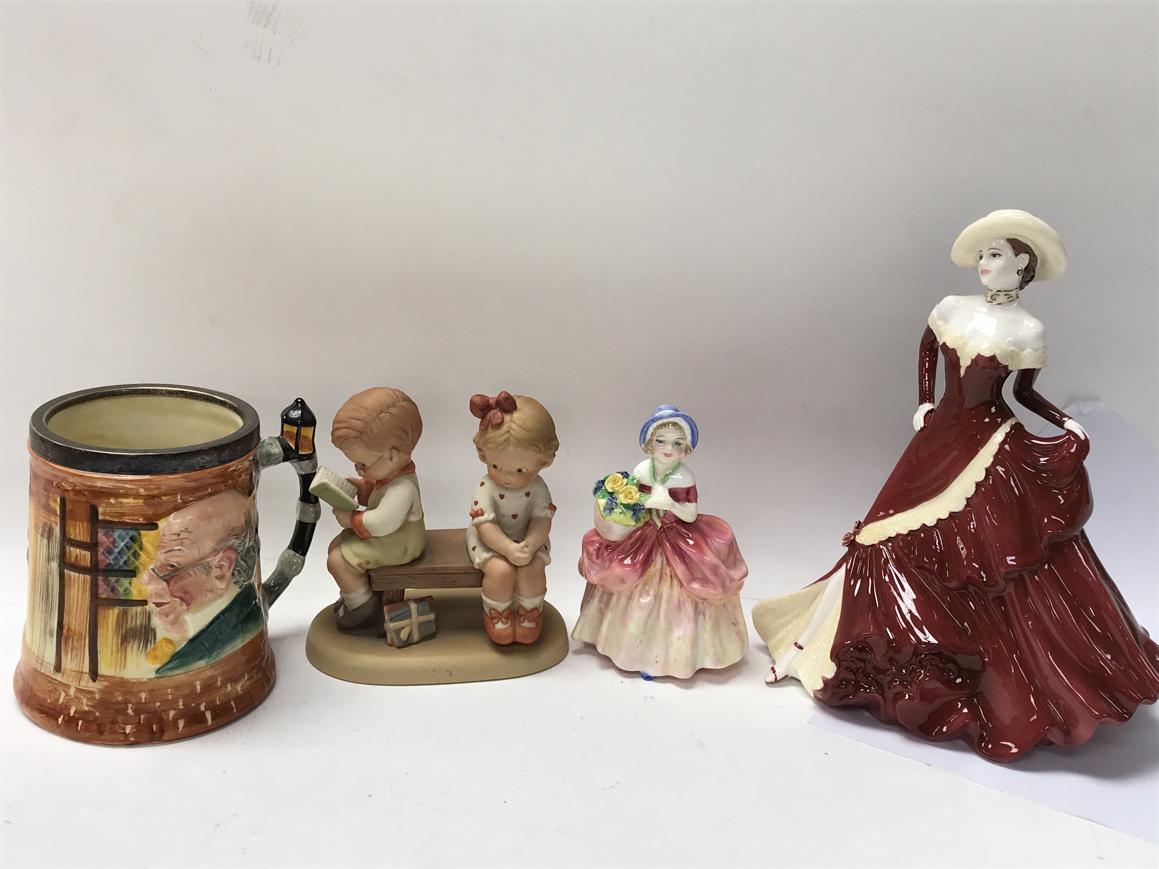 One Royal Doulton figure titled Cissie, one Coalpo