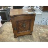 A small oak tobacco 2 draw cabinet with single lever lock in the form of a safe. 16 x 16 x 19cm.