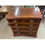 A quality reproduction chest of drawers with 2 sho