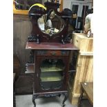 An Edwardian mahogany display cabinet measuring ap