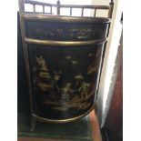 A corner cabinet decorated with orient style scene