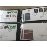 A collection of six Albums of Great Britain first day covers and 3 empty Albums.