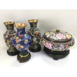 Three Cloisonne vases and a circular jar and cover