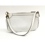 A small white leather handbag by Salvatore Ferragamo