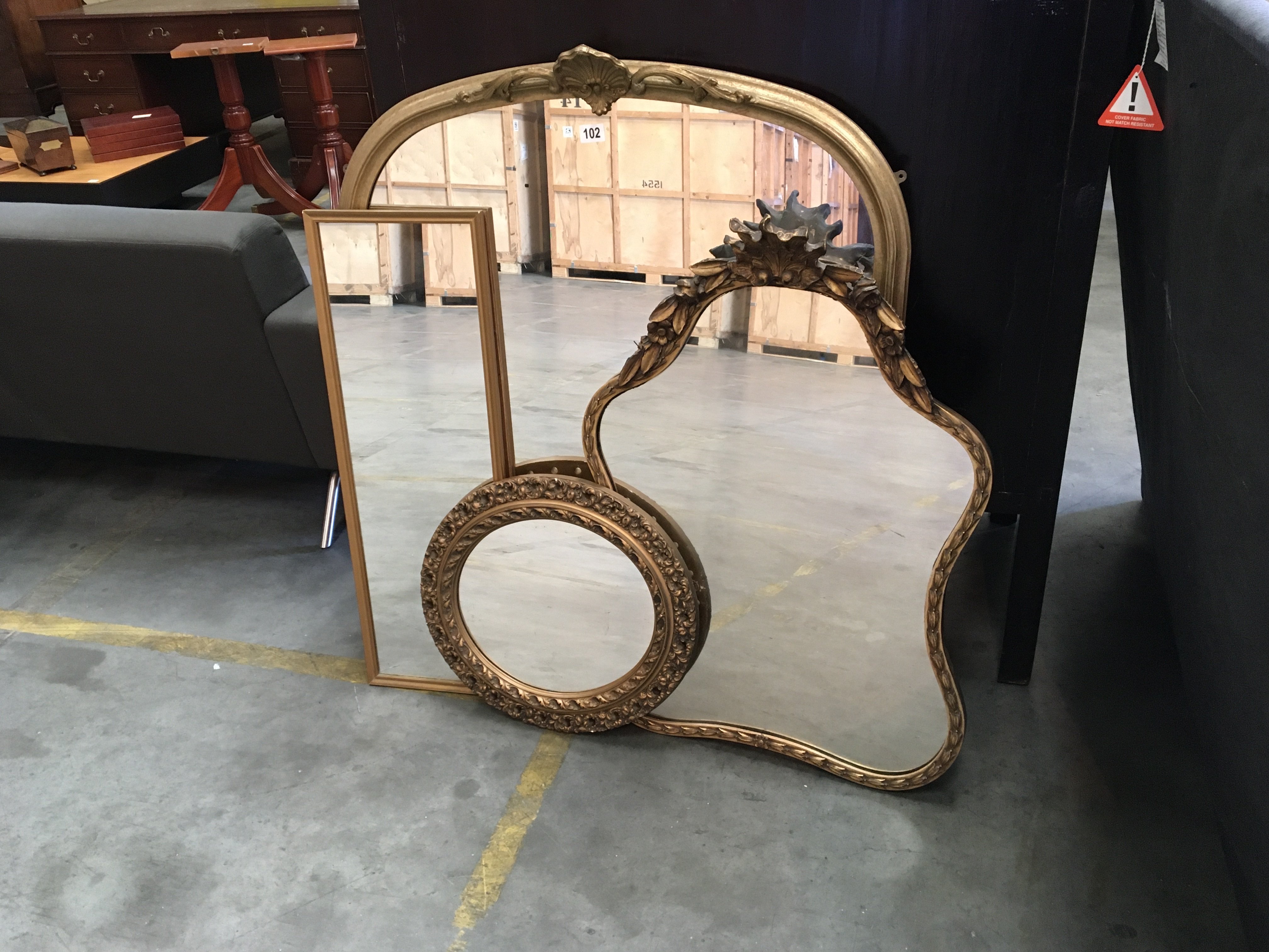 A collection of four gilt framed wall mirrors (4)