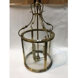 A brass and glass hall lantern light 38cm diameter Hight 80cm