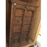 A Middle Eastern rustic interior design two door cabinet with iron fittings. Hight 165cm width 87cm