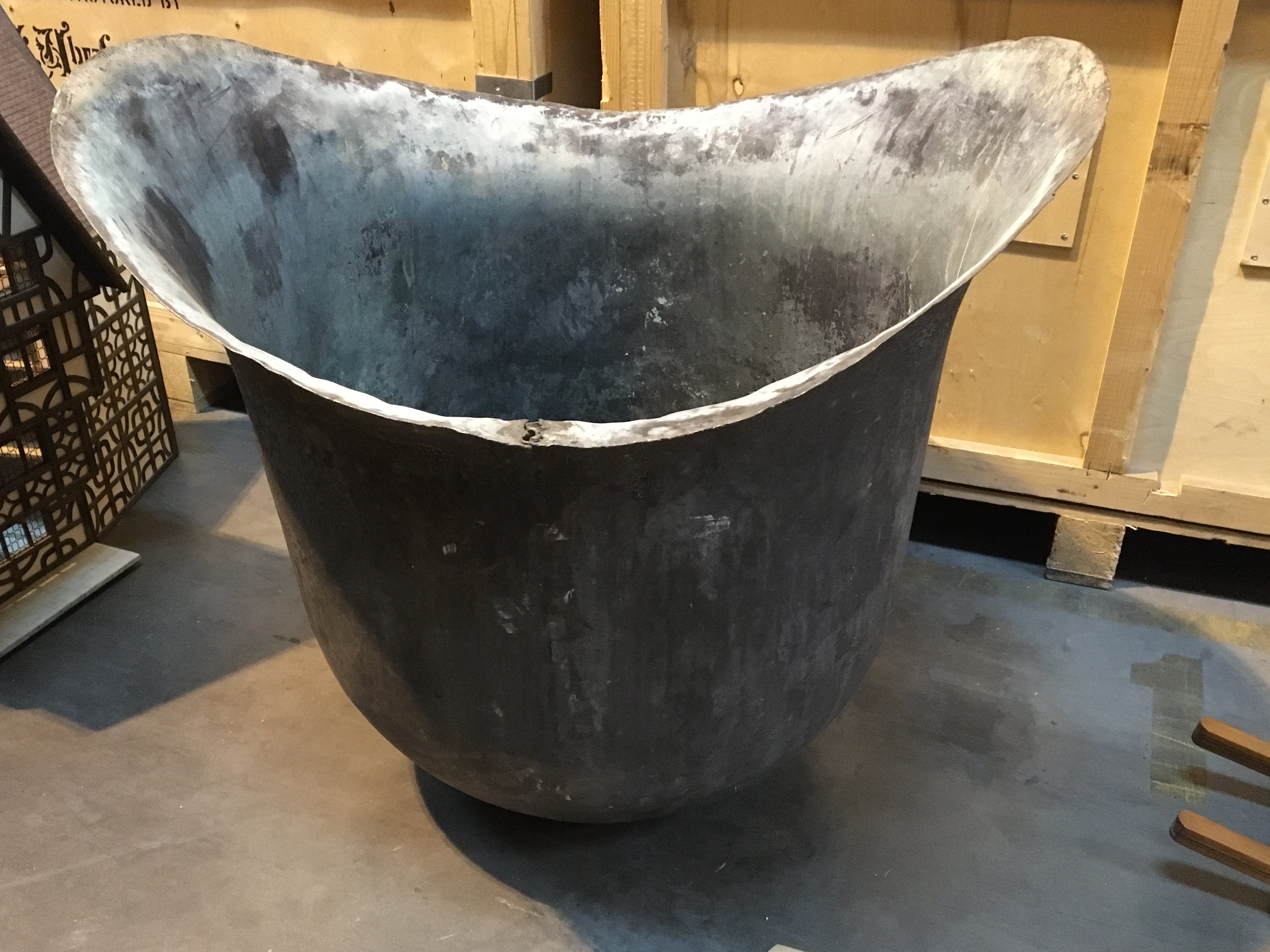 A large and unusual helmet shaped copper industrial size washing bowl. Hight 88cm diameter 93cm.
