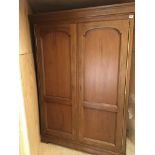 A large French rustic antique style wardrobe with external brass hinges. Hight 201cm width 141cm