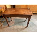 A mahogany card table with marquetry inlay.