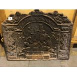 An Antique cast iron fireback. 71x58cm