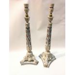A pair of Dresden porcelain lamp bases decorated with flowers and gilt no obvious damage. Hight