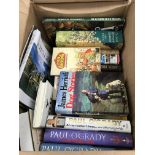 A box of a mixed collection of novels and books. N