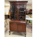 A 1920s mahogany glazed front bookcase.208 x 105 x