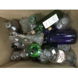 A box of glass bottles including apothecary jars,