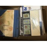 A small collection of presentation stamps and Worl