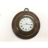 An early 19th Century circular wall clock by Thoma