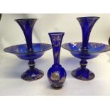 A pair of Bohemia Crystal blue glass table centre