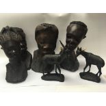 A collection of African carved hardwood Tourist Tr