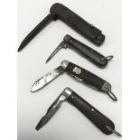 Four American folding steel blade pocket knives.