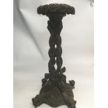 An unusual 19th century carved wood Indian stand w
