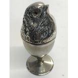 An unusual silver plated egg cup, with the lid mad