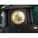 A Victorian slate mantle clock of classical form t
