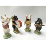 Four Beswick Pig Pro musical figures all with orig